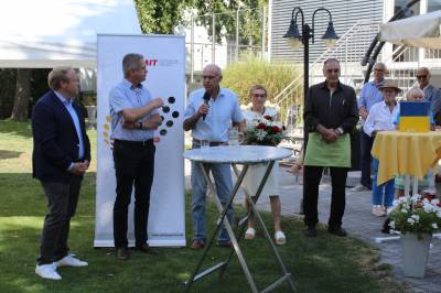 Am Mikrofon Werner Hartmann, Ehrenvorsitzender der MIT-Bergstrae.